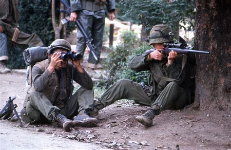 HUẾ 1968 Tet Offensive A Marine sniper takes aim from be Flickr