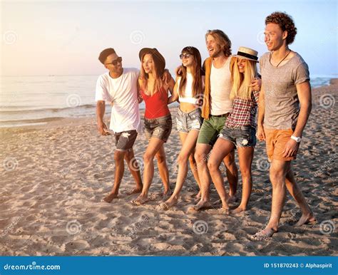 Group Of Friends Having Fun On The Beach Stock Image Image Of Sand Creative