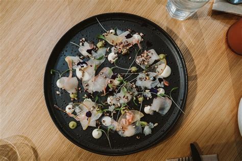 Couple's eating japanese sushi roll in a bento box source: 20 Best Restaurants in Melbourne, Australia - Bon Traveler