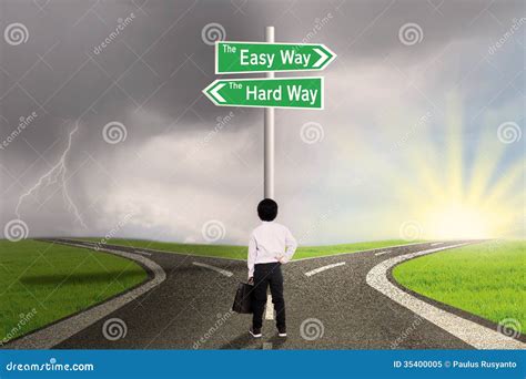 Little Boy Looking At Sign Of Easy Vs Hard Way Stock Image Image Of