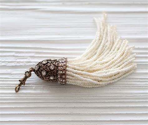 Ivory Beaded Tassel With Clear Rhinestones Antique Cap Ornate Bead