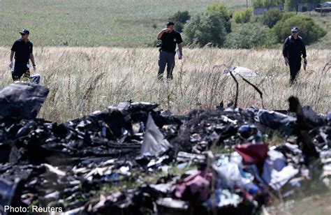21 More Mh17 Crash Victims Identified Experts Fly Home Malaysia
