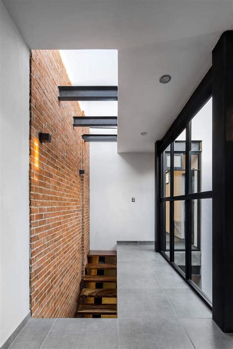 Exposed Brick Walls Steal The Show In This Modern Industrial Home