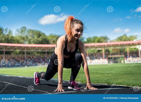 Fitness Woman Make Stretching And Warming Up Before Hard Workout At