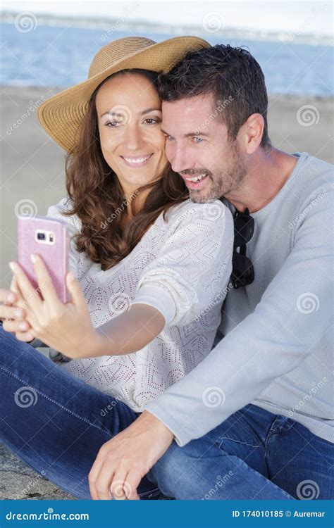 Happy Couple Taking Selfie At Beach During Sunny Day Stock Image Image Of Romance Smartphone