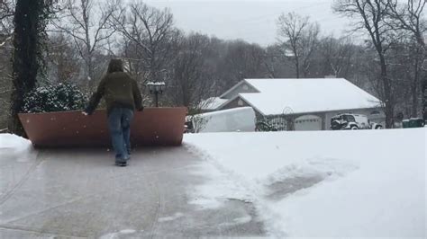 Hack For Shoveling Snow Off Driveway With Sheet Of Plywood Youtube