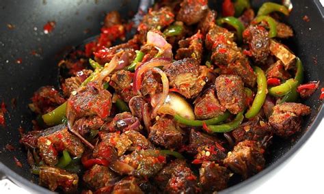 A Quick Easy Guide To Making Peppered Smoked Goat Meat Asun By Sisi Jemimah BellaNaija