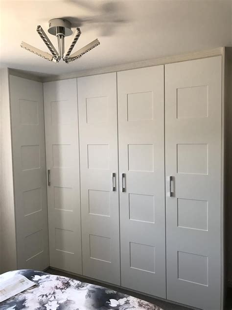 Choose the best wardrobe doors from our fitted wardrobes london showroom. One of our most popular designs | Grey wardrobe, Wardrobe ...