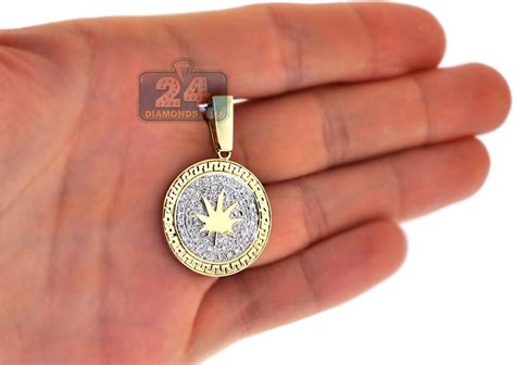 Boost your look with one of our gleaming gold pendants crafted in white and yellow gold from 10k to 24k. Mens Diamond Marijuana Round Pendant 10K Yellow Gold 0.62ct