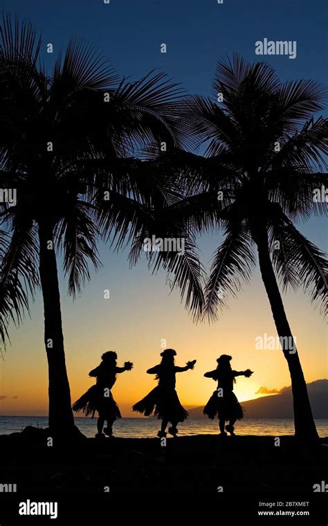 Three Hula Dancers At Sunset At Olowalu Maui Hawaii Stock Photo Alamy