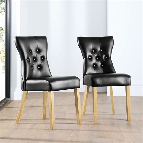 Buckingham dining chair black leather black leather dining. Bewley Black Leather Button Back Dining Chair (Oak Leg ...