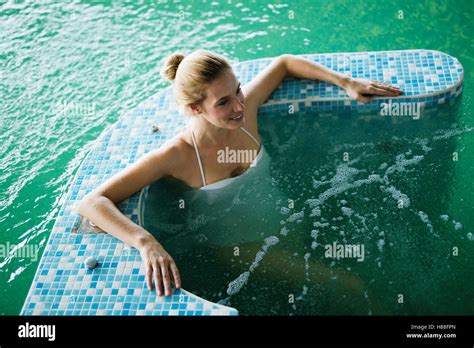 Woman Relaxing In Spa Pool With Bubble Bath Stock Photo Alamy