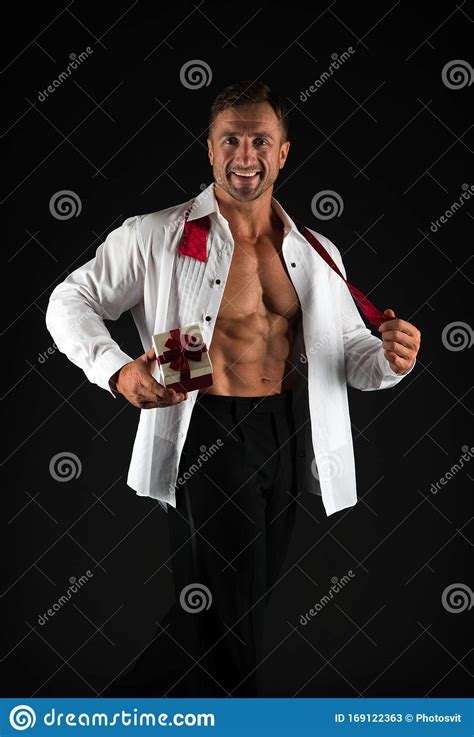 Romantic Muscular Shirtless Babe Man Looking At Champagne Flute Stock