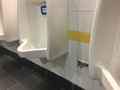 Someone Decided It Was Best To Remove All Dividers Between The Urinals