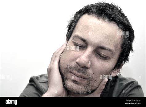 Young Man Suffering From Toothache Teeth Pain Swollen Face Stock