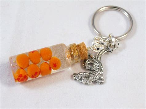 Check spelling or type a new query. Dragonball Z Inspired Keychain or Necklace - Bottled Dragon Balls Glass Vial. $16.00, via Etsy ...