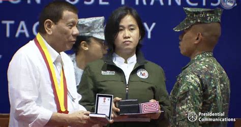 president duterte visits ph marine corps in taguig city confers order of lapu lapu on soldiers