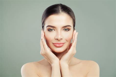 Healthy Smiling Woman With Clear Skin Touching Her Hands Face Stock