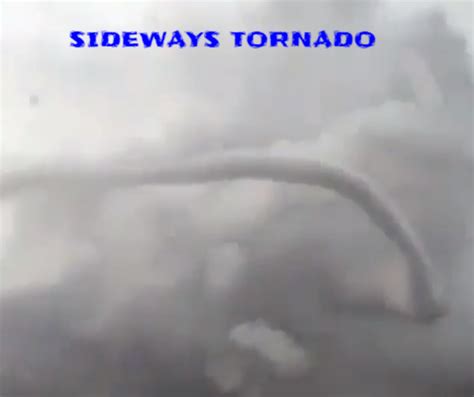 Sideways Tornado Opens Up And Guy Just Stands And Films It
