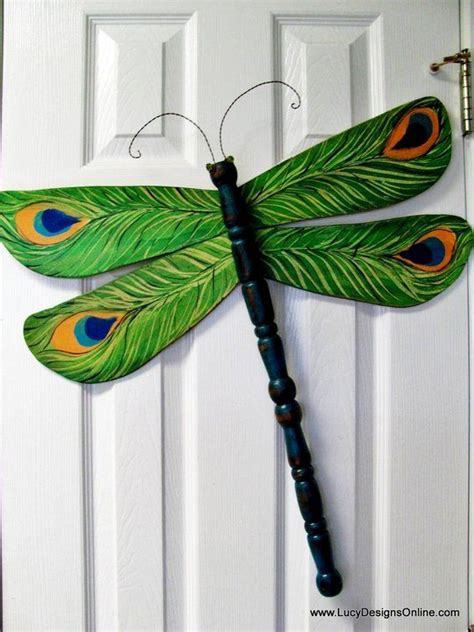 Crackle painted wings adorned with cabinet knobs, robe hook and drawer pulls. Peacock Painted Table | ... Table Leg Dragonfly And ...