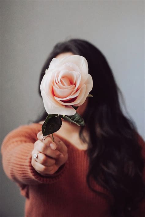Girl Holding Flower Pictures Download Free Images On Unsplash