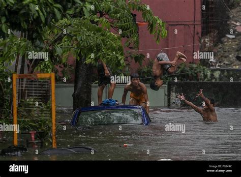 Manila Philippines 17th July 2018 Children Play Along A Flooded