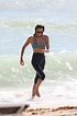 ELLE MACPHERSON in Bikini Top and Leggings at a Beach in Miami 10/13 ...