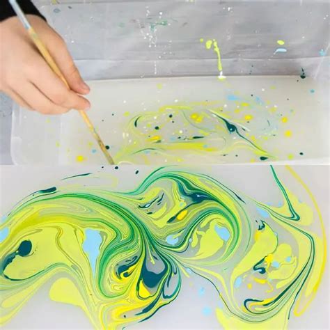Paper Marbling With Acrylic Paint Swirling The Paint For A Marble