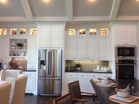 What factors should you consider when buying kitchen cabinets? I like the small display cabinets to take it to the ...