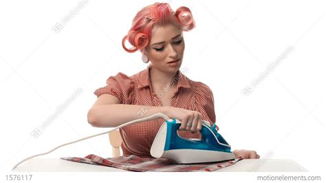 Beautiful Portrait Of Pin Up Girls Housewife With Iron Stock Video