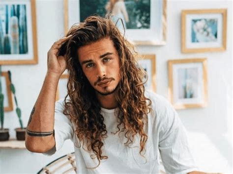 This is perfect for teenage boys with long hair because it requires very little upkeep and it will look amazing. 5 Men's Hairstyles You Can Rock If You Have Long Hair - Society19