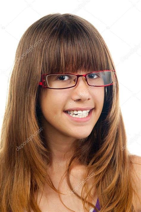 Portrait Of The Beautiful Smiling Teenage Girl With Glasses And