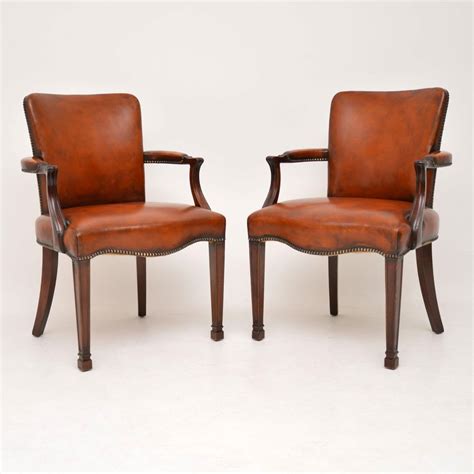 Add one to your bedroom or office to create another area for you to read, work or relax in style. Pair of Antique Leather & Mahogany Open Armchairs ...