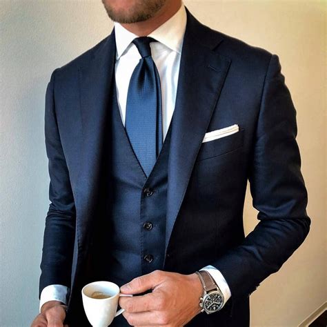 Look sharp from dawn to dusk with our suit combinations. Men's navy blue suit with white longsleeve combination ...