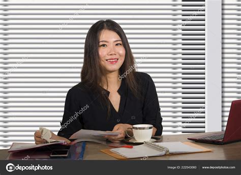 Young Beautiful Successful Asian Chinese Business Woman Working