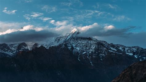Download Wallpaper 1366x768 Mountains Peaks Clouds Sky Himalayas