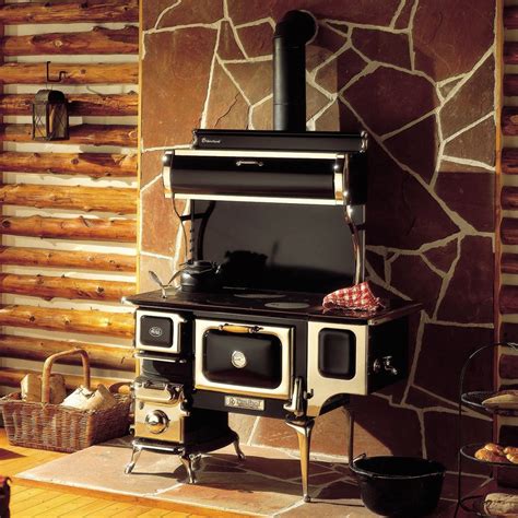 The Oval Wood Cookstove With Water Reservoir Provides Heat Meals And