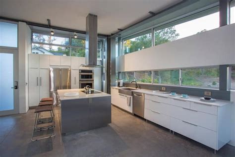 Fantastic, light wood white tops gray floor drawers. 33 Modern Kitchen Islands (Design Ideas) - Designing Idea