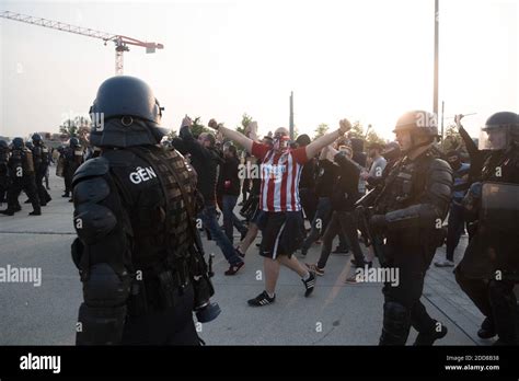 Atletico De Madrids Ultras Face The Police On Their Arrival At