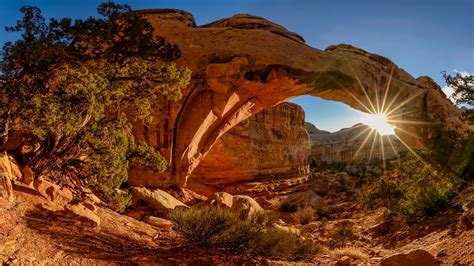 Stone Bridge Rays Sunset Landscape Arch In Arches National Park Utah
