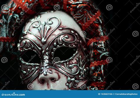 A Disturbing Mask With A Black Background Stock Photo Image Of Face