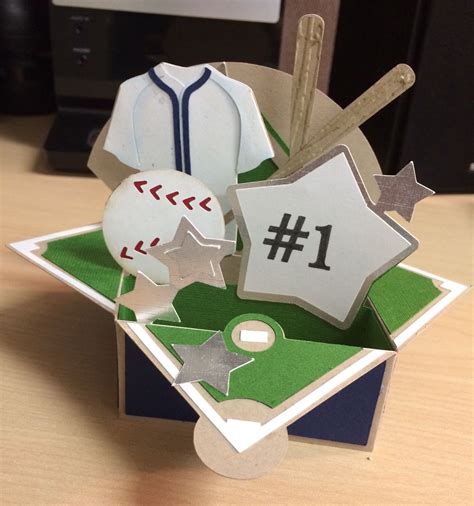 In this pop up card design the box tabs are glued under, toward the inside of the box. Fun baseball card in a box | Cricut birthday cards, Pop up ...