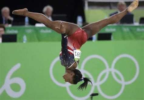 The Us Womens Gymnastics Team Wins Gold After A Gravity Defying Performance View Photos From