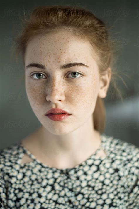 portrait of a beautiful girl with freckles by stocksy contributor andrei aleshyn stocksy