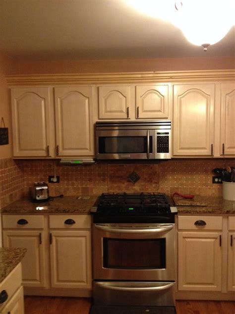 You can darken your pickled wooden cabinets to provide a more cohesive. Pickled pink kitchen cabinets