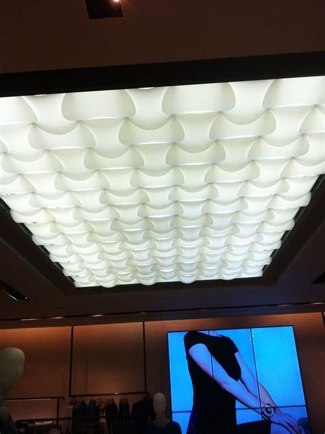 Lighting in a drop ceiling is often supplied by fluorescent light fixtures mounted to the rafters. Sculptural fluorescent light cover + LED video display ...