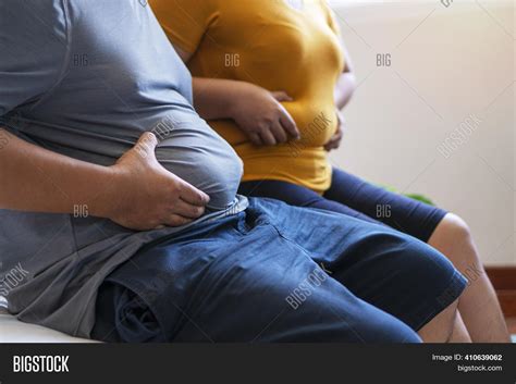 Fat Man Woman Holding Image And Photo Free Trial Bigstock