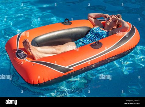 Woman In Swimming Pool Summer Rubber Boat Sunbathing Stock Photo Alamy