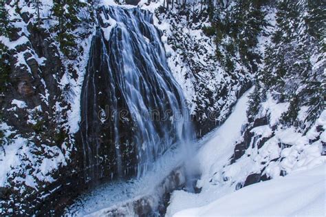 Beautiful Snowy Mountains And Beautiful Waterfall Stock Photo Image