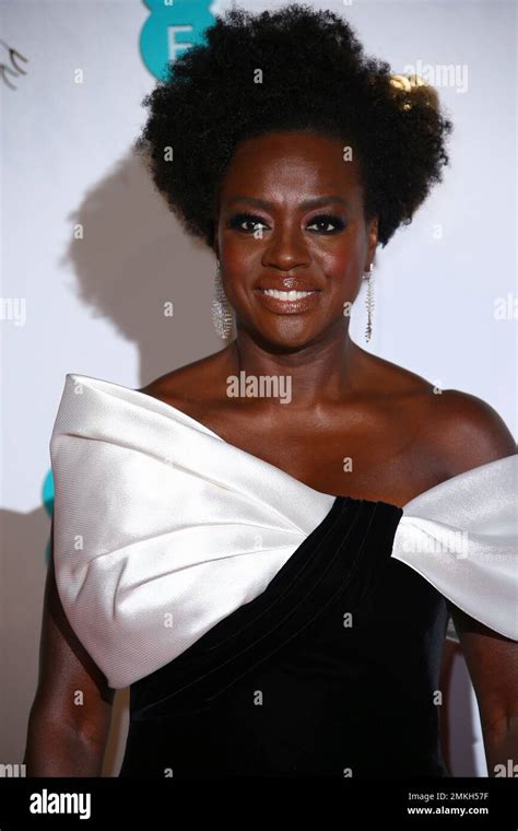 Viola Davis Poses For Photographers Upon Arrival At The Bafta Awards In